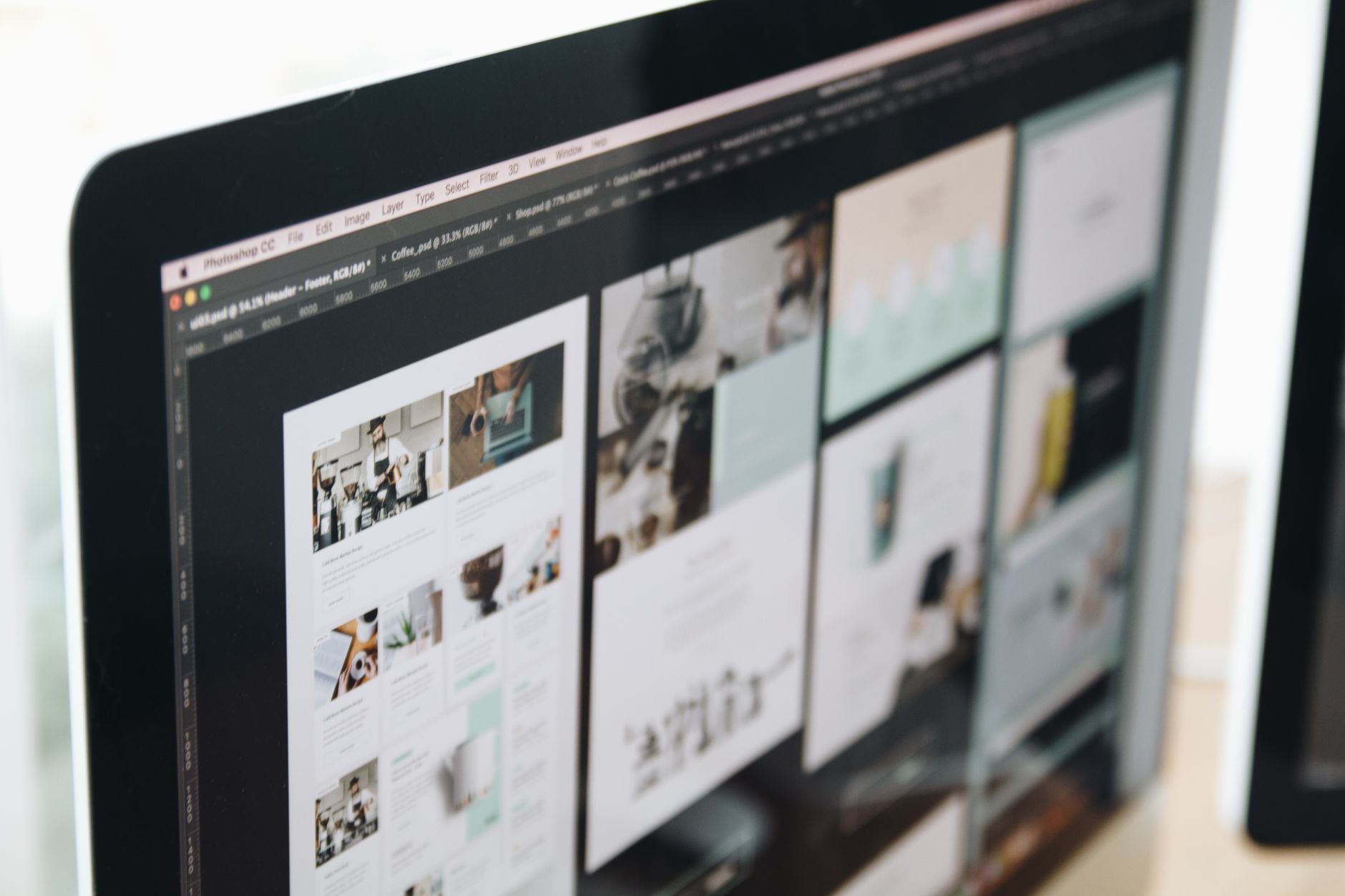 A desktop monitor showing a clean proposal page with large type and a single image