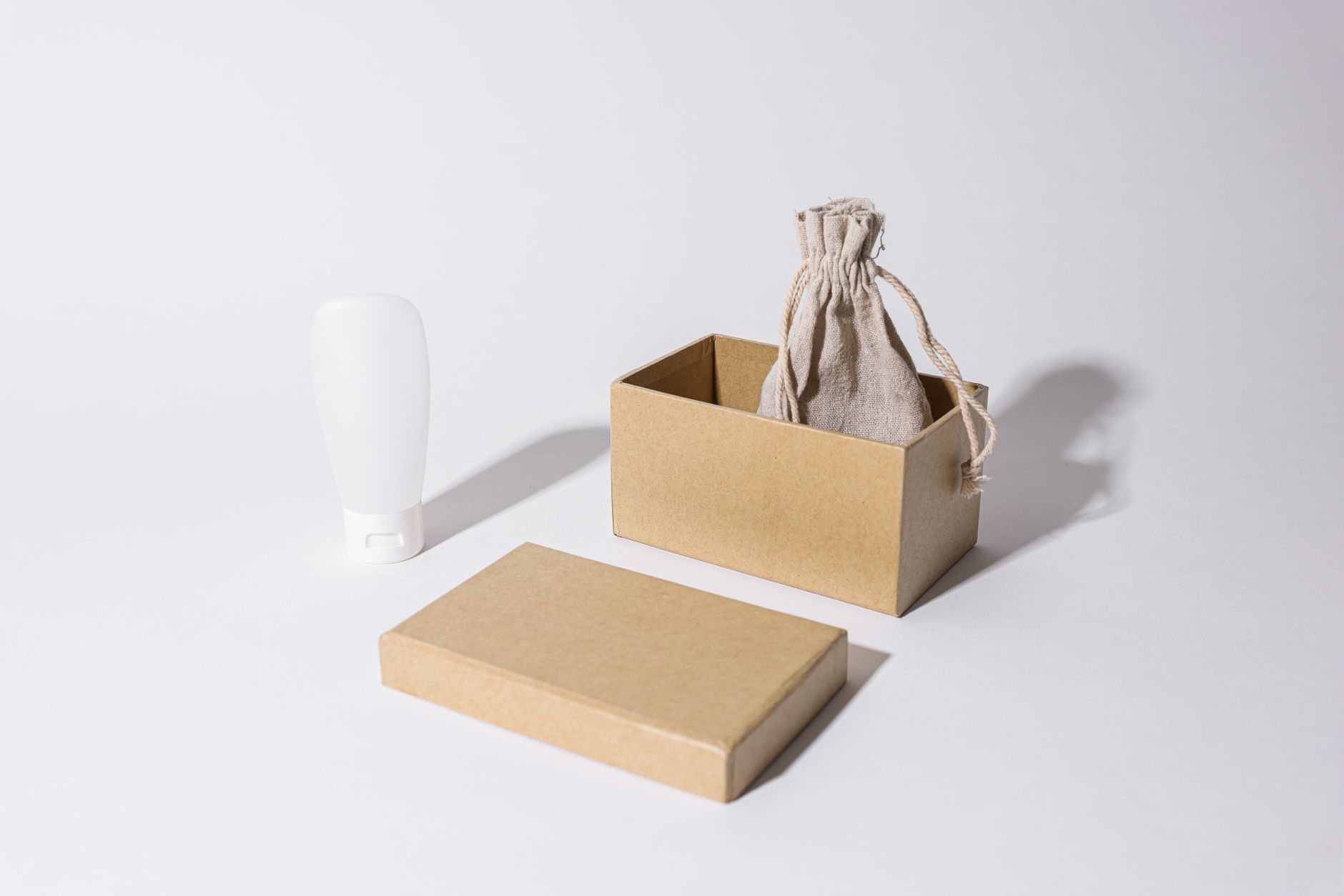 Packaging mockups arranged on a wooden table