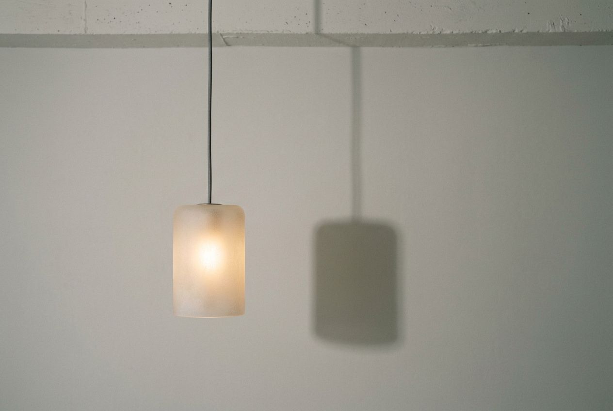 Frosted glass pendant on a studio set
