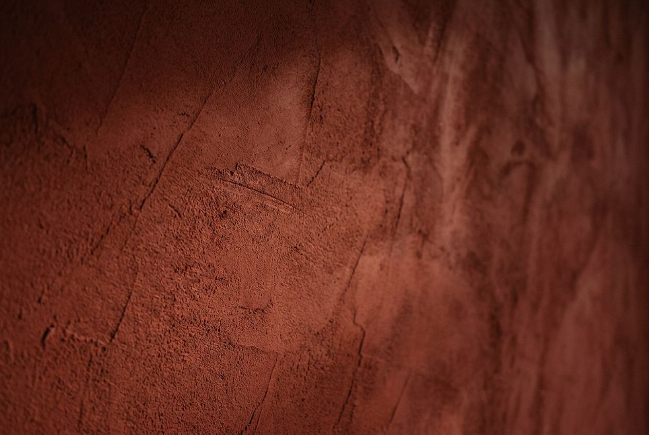 Iron red lime plaster
